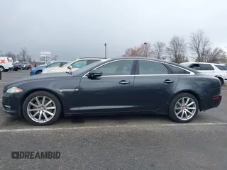 2014 Jaguar XJ with VIN SAJWA1CZ0E8V73966, listed as a IAAI auction lot 41887234 with 120,804 mi miles and . Bid and sale history available at DreamBid. Image 14.
