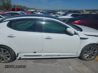2015 Kia Optima SXL Turbo with VIN 5XXGR4A61FG428391, listed as a IAAI auction lot 41869452 with 63,130 mi miles and . Bid and sale history available at DreamBid. Image 13.