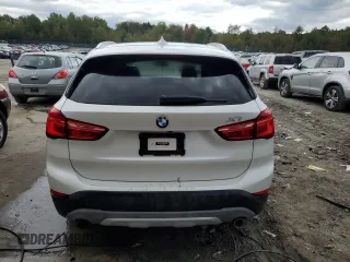 2017 BMW X1 xDrive28i z VIN WBXHT3C35H5F68041, wystawiony jako Copart lot #74858123 z przebiegiem 103 234 mil mil oraz Szkody całkowita. Historia ofert i sprzedaży dostępna na DreamBid. Obrazek 6.