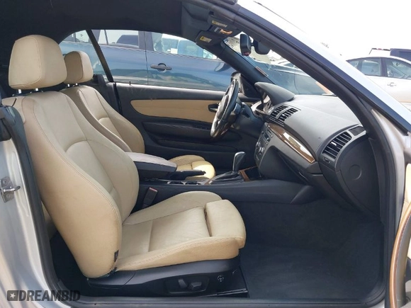 2010 BMW 1 Series 128i with VIN WBAUL7C58AVJ78135, listed as a IAAI auction lot 41615767 with 107,384 mi miles. Bid and sale history available at carsss.com. Image 5.