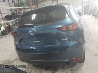 2019 Mazda CX-5 Touring with VIN JM3KFBCM1K0584369, listed as a IAAI auction lot 41657765 with 77,934 mi miles. Bid and sale history available at carsss.com. Image 16.