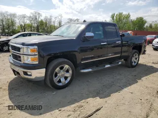 2014 Chevrolet Silverado 1500 LTZ with VIN 1GCVKSEC3EZ269921, listed as a Copart auction lot 51528565 with 137,218 mi miles and Salvage Title. Bid and sale history available at DreamBid. Image 1.