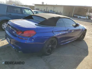 2015 BMW M6 z VIN WBSLZ9C55FD651441, wystawiony jako Copart lot #78511203 z przebiegiem 45 569 mil mil oraz Czysty tytuł • Clean title. Historia ofert i sprzedaży dostępna na DreamBid. Obrazek 3.