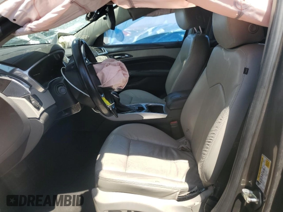 2014 Cadillac SRX z VIN 3GYFNAE37ES609830, wystawiony jako Copart lot #51542955 z przebiegiem 122 560 mil mil oraz Szkoda całkowita • Salvage title. Historia ofert i sprzedaży dostępna na DreamBid. Obrazek 7.