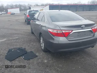 2015 Toyota Camry XLE with VIN 4T1BF1FKXFU936775, listed as a IAAI auction lot 41807486 with 97,148 mi miles and . Bid and sale history available at DreamBid. Image 3.
