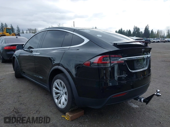 2016 Tesla Model X 70D with VIN 5YJXCBE20GF013046, listed as a IAAI auction lot 41944005 with 94,509 mi miles. Bid and sale history available at carsss.com. Image 3.