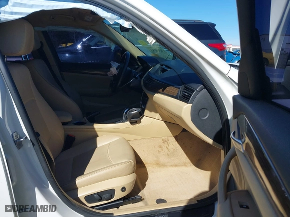 2015 BMW X1 sDrive28i with VIN WBAVM1C53FV317173, listed as a IAAI auction lot 41586385 with 146,068 mi miles. Bid and sale history available at carsss.com. Image 5.