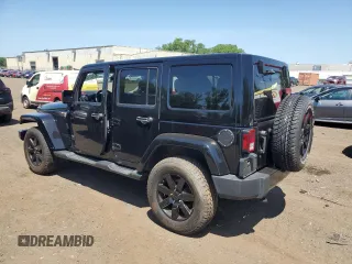 2014 Jeep Wrangler Unlimited Sahara with VIN 1C4HJWEG5EL312006, listed as a Copart auction lot 61821445 with 159,416 mi miles and Salvage title. Bid and sale history available at DreamBid. Image 2.