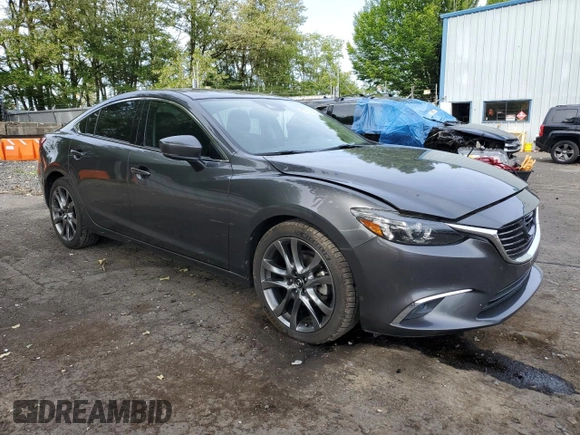 2017 Mazda 6 Grand Touring с VIN JM1GL1W55H1140064, выставлен на аукционе Copart как лот 57503425 с пробегом 74 304 миль миль и Списание • Salvage title. История ставок и продаж доступна на DreamBid. Изображение 4.