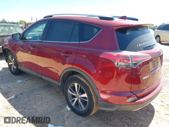 2018 Toyota RAV4 XLE with VIN 2T3WFREVXJW434957, listed as a IAAI auction lot 42002561 with 111,590 mi miles and . Bid and sale history available at carsss.com. Image 3.