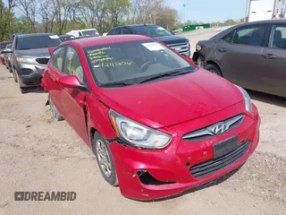 2012 Hyundai Accent GLS z VIN KMHCT4AE1CU075059, wystawiony jako IAAI lot #42113874 z przebiegiem 122 284 mil mil oraz . Historia ofert i sprzedaży dostępna na DreamBid. Obrazek 1.