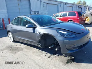 2022 Tesla Model 3 Long Range with VIN 5YJ3E1EB3NF290550, listed as a IAAI auction lot 41826287 with 67,648 mi miles. Bid and sale history available at carsss.com. Image 1.