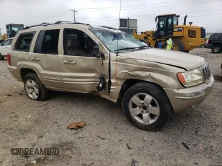 2001 Jeep Grand Cherokee Limited with VIN 1J4GW58S11C649736, listed as a Copart auction lot 66080214 with 199,584 mi miles and Salvage Title. Bid and sale history available at carsss.com. Image 4.