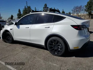 2022 Tesla Model Y Long Range with VIN 7SAYGDEE4NF357428, listed as a Copart auction lot 50345715 with 45,168 mi miles and Salvage Title. Bid and sale history available at carsss.com. Image 2.