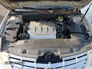 2006 Cadillac DTS w/1SC with VIN 1G6KD57Y56U132648, listed as a IAAI auction lot 41862030 with 128,003 mi miles. Bid and sale history available at carsss.com. Image 10.