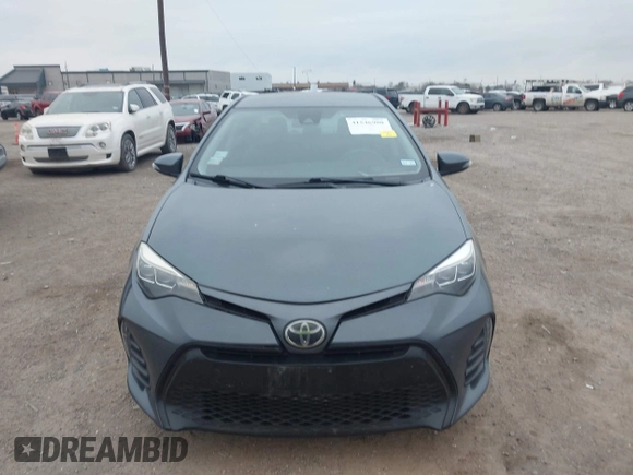 2019 Toyota Corolla L with VIN 5YFBURHE4KP918795, listed as a IAAI auction lot 41546980 with 72,786 mi miles and . Bid and sale history available at DreamBid. Image 12.