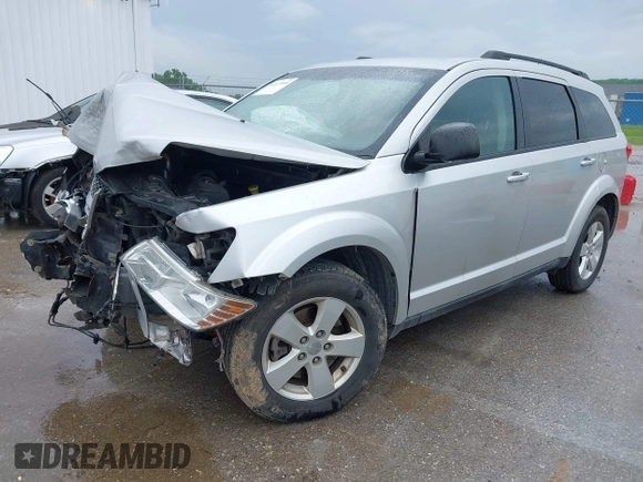 2013 Dodge Journey Canada Value z VIN 3C4PDCABXDT563439, wystawiony jako IAAI lot #42227899 z przebiegiem 213 199 mil mil oraz . Historia ofert i sprzedaży dostępna na DreamBid. Obrazek 16.