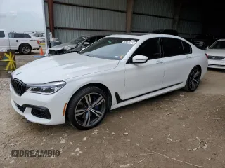 2017 BMW 7 Series 750i with VIN WBA7F0C5XHGM21437, listed as a Copart auction lot 55671543 with 65,085 mi miles. Bid and sale history available at carsss.com. Image 1.