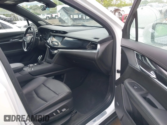 2021 Cadillac XT6 Premium Luxury z VIN 1GYKPDRS0MZ141453, wystawiony jako IAAI lot #42215954 z przebiegiem 144 245 mil mil oraz . Historia ofert i sprzedaży dostępna na DreamBid. Obrazek 5.
