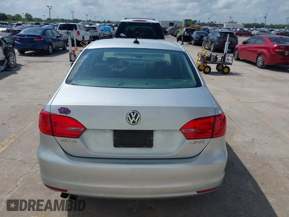2012 Volkswagen Jetta Sedan SE w/Convenience with VIN 3VWDX7AJ1CM401939, listed as a IAAI auction lot 41941070 with 123,611 mi miles. Bid and sale history available at carsss.com. Image 16.