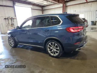 2019 BMW X5 xDrive50i с VIN 5UXJU2C57KLN67396, выставлен на аукционе Copart как лот 55074805 с пробегом 62 727 миль миль и Списание • Salvage title. История ставок и продаж доступна на DreamBid. Изображение 2.