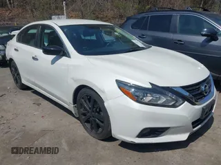 2017 Nissan Altima SV z VIN 1N4AL3AP8HC288973, wystawiony jako IAAI lot #42041318 z przebiegiem 80 437 mil mil oraz . Historia ofert i sprzedaży dostępna na DreamBid. Obrazek 1.
