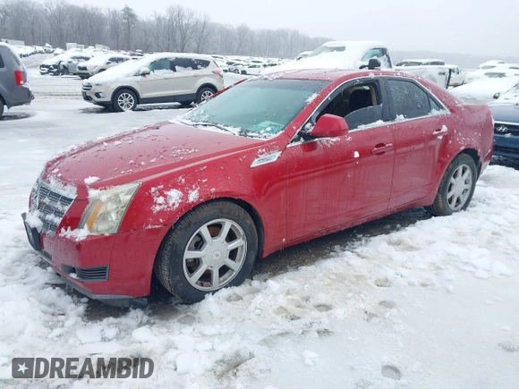 2008 Cadillac CTS AWD w/1SB with VIN 1G6DS57VX80129520, listed as a IAAI auction lot 41569142 with 131,828 mi miles. Bid and sale history available at carsss.com. Image 2.