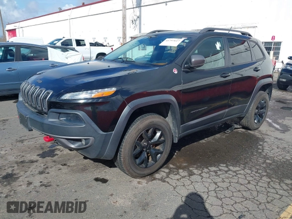 2015 Jeep Cherokee Trailhawk with VIN 1C4PJMBS7FW699392, listed as a IAAI auction lot 41797617 with 1 mi miles. Bid and sale history available at carsss.com. Image 17.