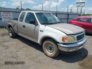 1998 Ford F-150 with VIN 1FTZX1764WNB11214, listed as a IAAI auction lot 42582153 with 431,687 mi miles and . Bid and sale history available at DreamBid. Image 1.