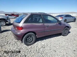 1996 Geo Metro z VIN 2C1MR2296T6778911, wystawiony jako Copart lot #50937725 z przebiegiem 157 821 mil mil oraz Szkoda całkowita • Salvage title. Historia ofert i sprzedaży dostępna na DreamBid. Obrazek 3.