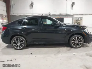 2019 BMW X6 xDrive35i with VIN 5UXKU2C51K0Z64897, listed as a IAAI auction lot 41759156 with 64,434 mi miles. Bid and sale history available at carsss.com. Image 12.