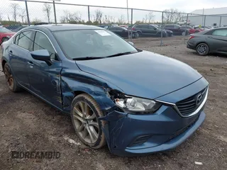 2016 Mazda Mazda6 i Touring with VIN JM1GJ1V56G1439360, listed as a IAAI auction lot 41987987 with 155,271 mi miles. Bid and sale history available at carsss.com. Image 1.
