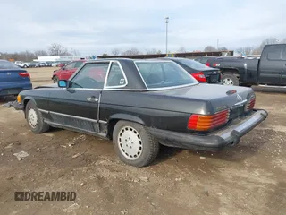 1988 Mercedes-Benz 560 Series 560SL with VIN WDBBA48D9JA081286, listed as a IAAI auction lot 41742395 with 143,034 mi miles. Bid and sale history available at carsss.com. Image 3.
