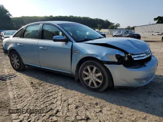 2008 Ford Taurus SEL with VIN 1FAHP24W68G187312, listed as a Copart auction lot 62879765 with 154,706 mi miles and Salvage title. Bid and sale history available at DreamBid. Image 4.