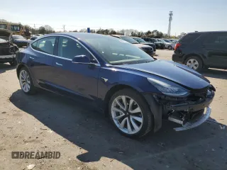 2019 Tesla Model 3 Mid Range with VIN 5YJ3E1EA6KF412837, listed as a Copart auction lot 50871195 with 39,570 mi miles and Salvage Title. Bid and sale history available at DreamBid. Image 4.