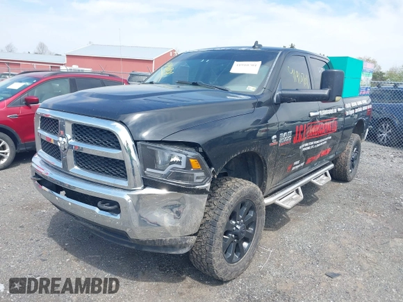 2013 Ram 2500 Big Horn z VIN 3C6UR5DL9DG549987, wystawiony jako IAAI lot #41910701 z przebiegiem 217 477 mil mil oraz . Historia ofert i sprzedaży dostępna na DreamBid. Obrazek 17.