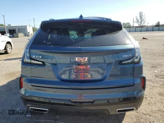 2024 Cadillac XT4 FWD Sport with VIN 1GYFZER40RF230208, listed as a Copart auction lot 80385984 with Not provided miles and Non repairable. Bid and sale history available at DreamBid. Image 6.