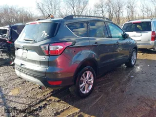 2017 Ford Escape SE with VIN 1FMCU0GD5HUC95607, listed as a IAAI auction lot 41665048 with 79,199 mi miles. Bid and sale history available at carsss.com. Image 4.
