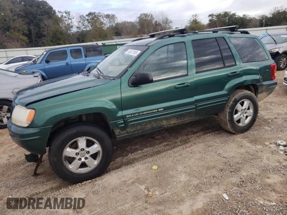 1999 Jeep Grand Cherokee Limited with VIN 1J4GW68S1XC744666, listed as a Copart auction lot 88337895 with 243,480 mi miles and Salvage Title. Bid and sale history available at carsss.com. Image 1.