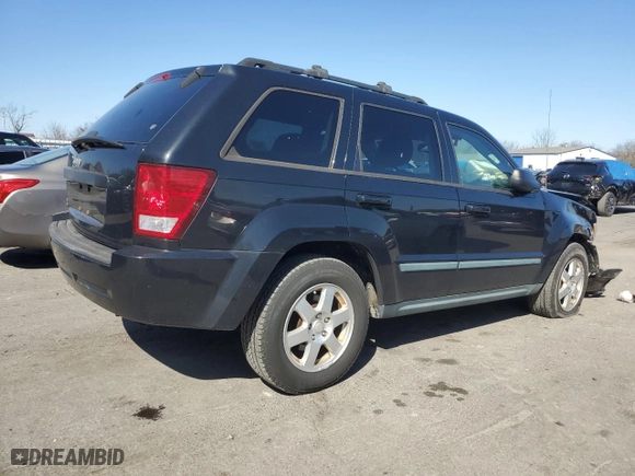 2009 Jeep Grand Cherokee Laredo with VIN 1J8GR48K19C533447, listed as a Copart auction lot 48700275 with 115,991 mi miles and Salvage Title. Bid and sale history available at carsss.com. Image 3.