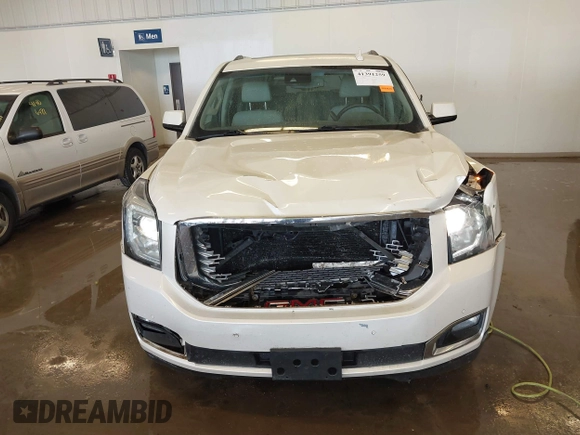 2015 GMC Yukon XL Denali with VIN 1GKS2JKJXFR528927, listed as a IAAI auction lot 41391259 with 159,467 mi miles. Bid and sale history available at carsss.com. Image 12.