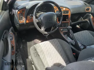 1997 Toyota Celica GT z VIN JT5FG02T3V0041206, wystawiony jako Copart lot #54601725 z przebiegiem 198 685 mil mil oraz Szkody całkowita. Historia ofert i sprzedaży dostępna na DreamBid. Obrazek 8.