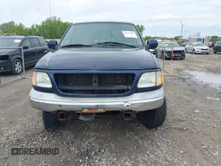 2003 Ford F-150 XLT with VIN 1FTRW08L63KD55851, listed as a IAAI auction lot 42359388 with Not provided miles and . Bid and sale history available at DreamBid. Image 6.