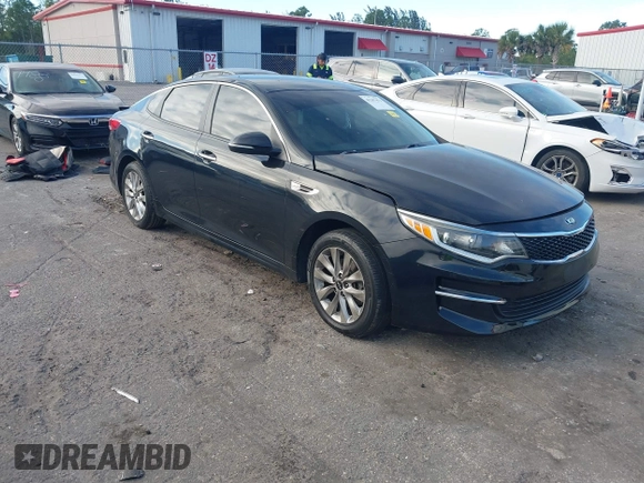 2018 Kia Optima LX with VIN 5XXGT4L38JG256924, listed as a IAAI auction lot 41267413 with 129,820 mi miles and . Bid and sale history available at DreamBid. Image 1.