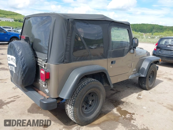 2003 Jeep Wrangler SE with VIN 1J4FA29193P302424, listed as a IAAI auction lot 42179494 with 120,712 mi miles and . Bid and sale history available at DreamBid. Image 4.