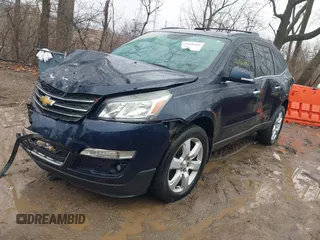 2016 Chevrolet Traverse LT z VIN 1GNKRGKD5GJ166369, wystawiony jako IAAI lot #41468465 z przebiegiem 113 058 mil mil oraz . Historia ofert i sprzedaży dostępna na DreamBid. Obrazek 18.