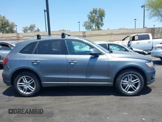 2016 Audi Q5 Premium Plus z VIN WA1L2AFP9GA104440, wystawiony jako IAAI lot #42598977 z przebiegiem 101 167 mil mil oraz . Historia ofert i sprzedaży dostępna na DreamBid. Obrazek 13.