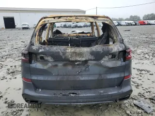 2021 BMW X5 xDrive40i with VIN 5UXCR6C07M9E66741, listed as a Copart auction lot 56325415 with Not provided miles and Salvage title. Bid and sale history available at DreamBid. Image 6.