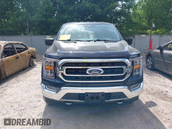 2021 Ford F-150 XL z VIN 1FTFW1E5XMFA57179, wystawiony jako IAAI lot #42561205 z przebiegiem 90 517 mil mil oraz . Historia ofert i sprzedaży dostępna na DreamBid. Obrazek 12.