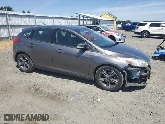2014 Ford Focus SE z VIN 1FADP3K24EL317353, wystawiony jako Copart lot #57181215 z przebiegiem 144 495 mil mil oraz Szkoda całkowita • Salvage title. Historia ofert i sprzedaży dostępna na DreamBid. Obrazek 4.
